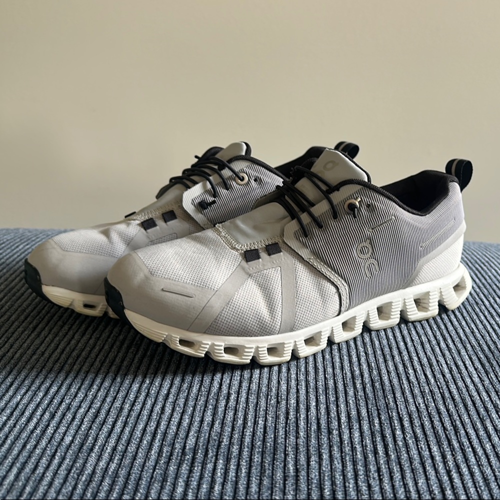 On Running Gray and White Athletic Shoes